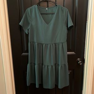 Boutique blue/green dress size small. Would fit a 4-6. No signs of wear